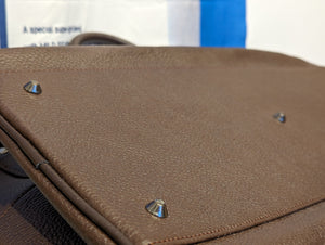 Close-up of the bottom of Boss Coffee Leather Duffle Bag