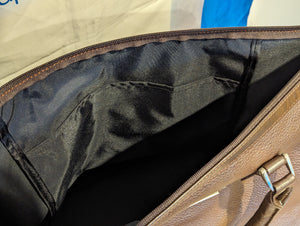 Close-up interior of Boss Coffee Leather Duffle Bag