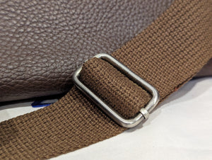 Close-up of shoulder strap for Boss Coffee Leather Duffle Bag